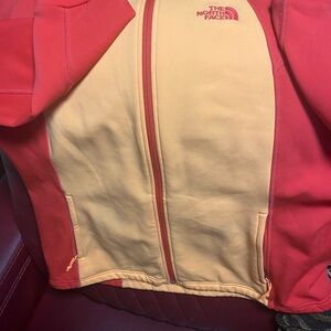 The North Face Orange and peach  Jacket Women’s XL (soft stretchy material)
